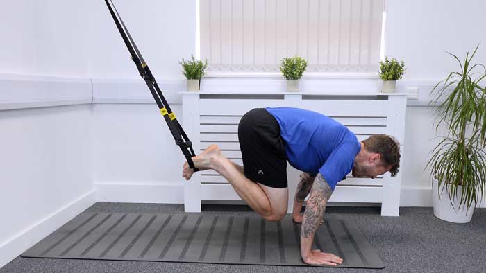 TRX Core exercise knee tucks